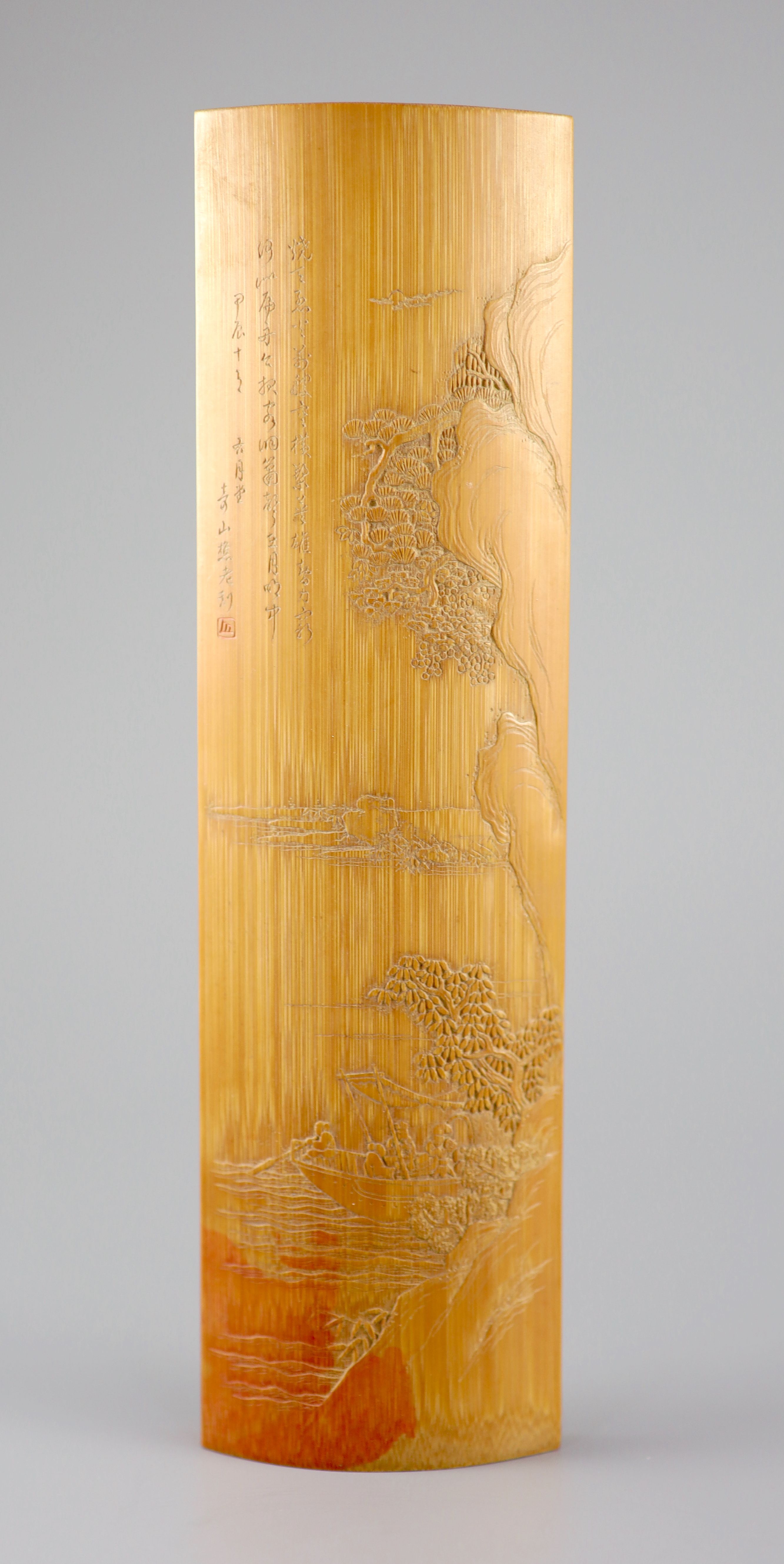 A Chinese carved bamboo wrist rest, Republic period, 22.7 cm long